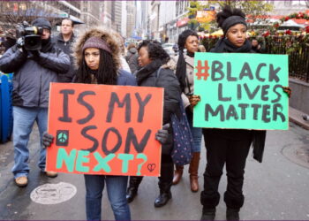 NYC action in solidarity with Ferguson. Mo, encouraging a boycott of Black Friday Consumerism.