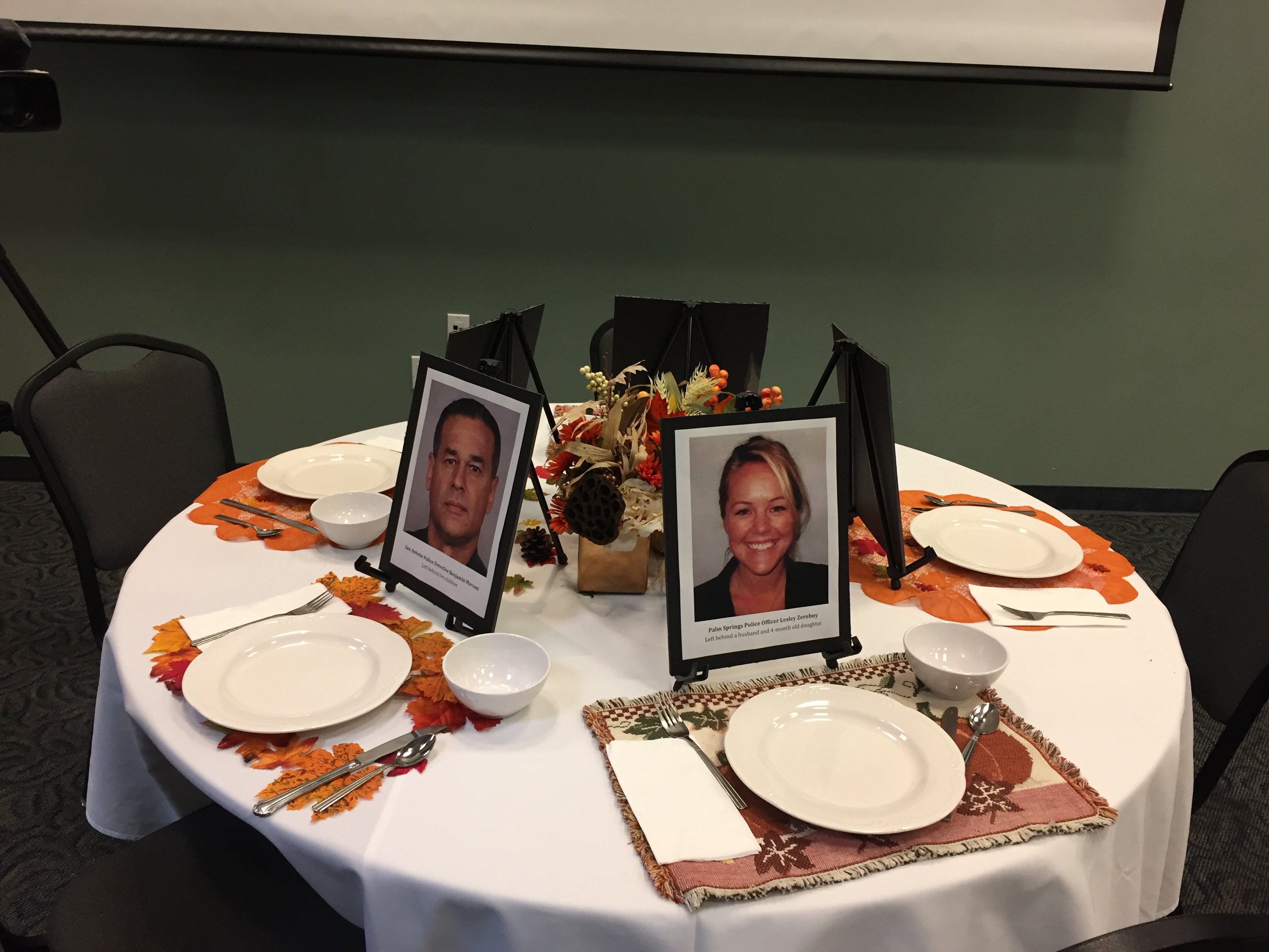 A mock Thanksgiving table is adorned by police officers fatally shot in recent weeks across the country as part of news conference by the San Jose Police Officers' Association on Nov. 23, 2016.
