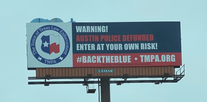 This billboard went up in 2020 when the Austin City Council drastically cut the police budget.