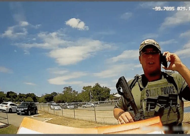 Texas Ranger Christopher Ryan Kindell outside Robb Elementary School in Uvalde on May 24, 2022, when 19 people 17 children and two adults were killed by a gunman. Kindell was fired by DPS Thursday and said he plans to appeal. (Texas Parks And Wildlife Bodycam, Texas Parks And Wildlife Bodycam)