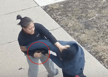 The off-duty officer fights with the suspect to maintain possession of her weapon. (COPA)