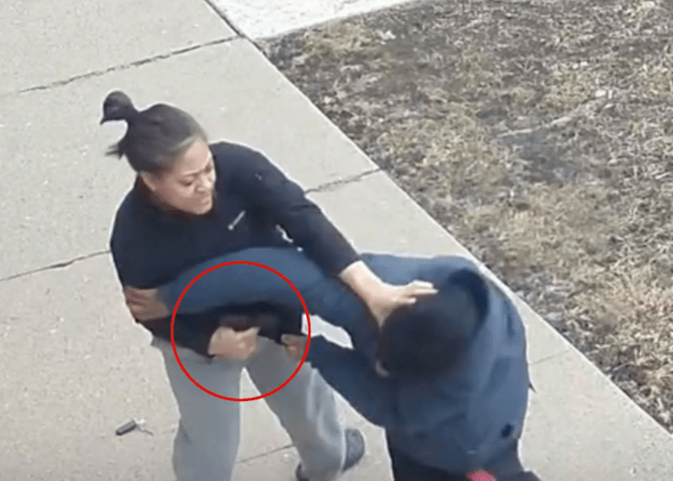 The off-duty officer fights with the suspect to maintain possession of her weapon. (COPA)